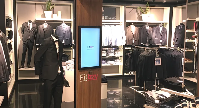 A Fitizzy screen in the middle of a partner store’s shop floor